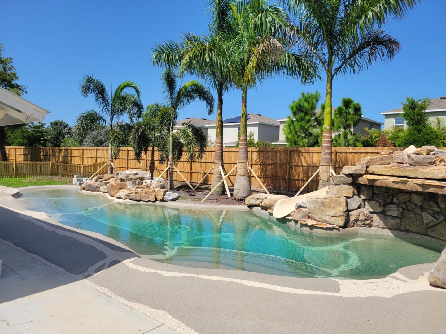 Closeup shot of the pool water and trees around