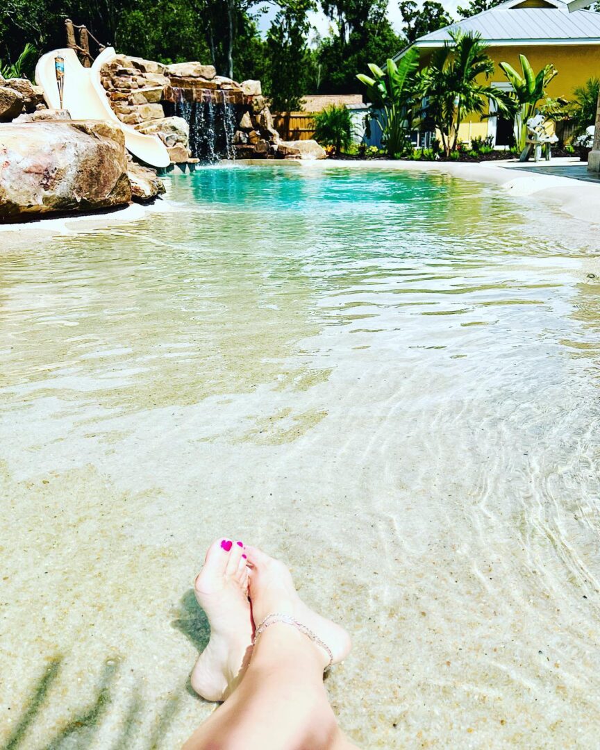 Closeup shot of the woman relaxing in the pool